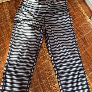 Athleta Women’s size small Black & White Striped Active Leggings - cropped
